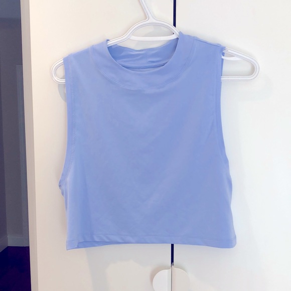 This is on perfect condition, and is an amazing summer/spring tank top. - Picture 1 of 4